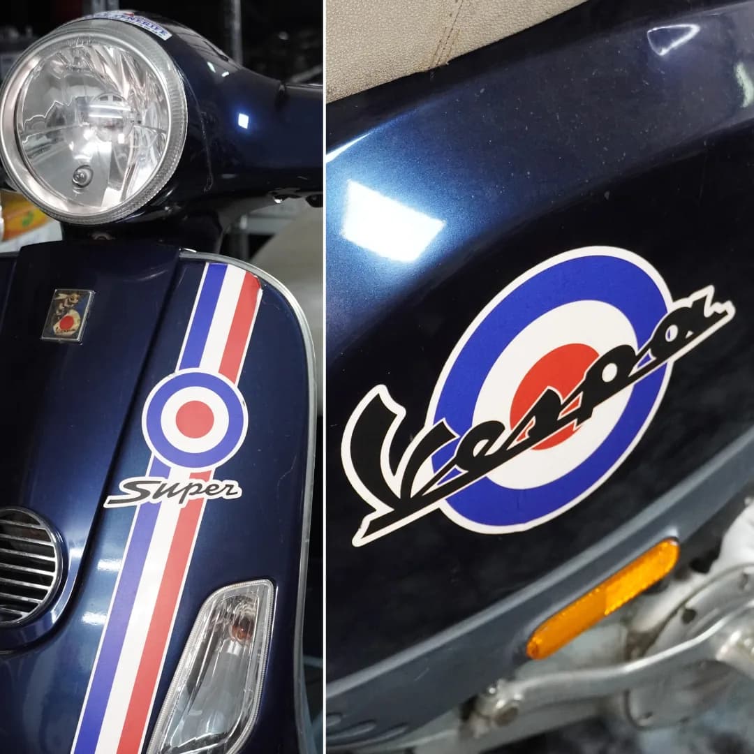 Close-up of the front of a Vespa from the fleet