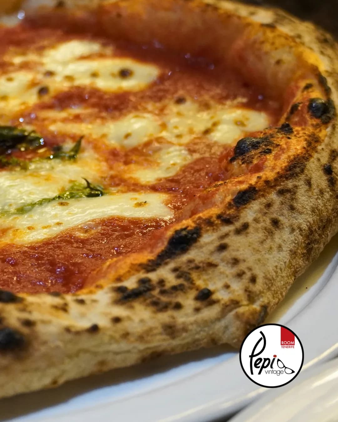 Neapolitan pizza fresh out of the oven, with a well-risen crust