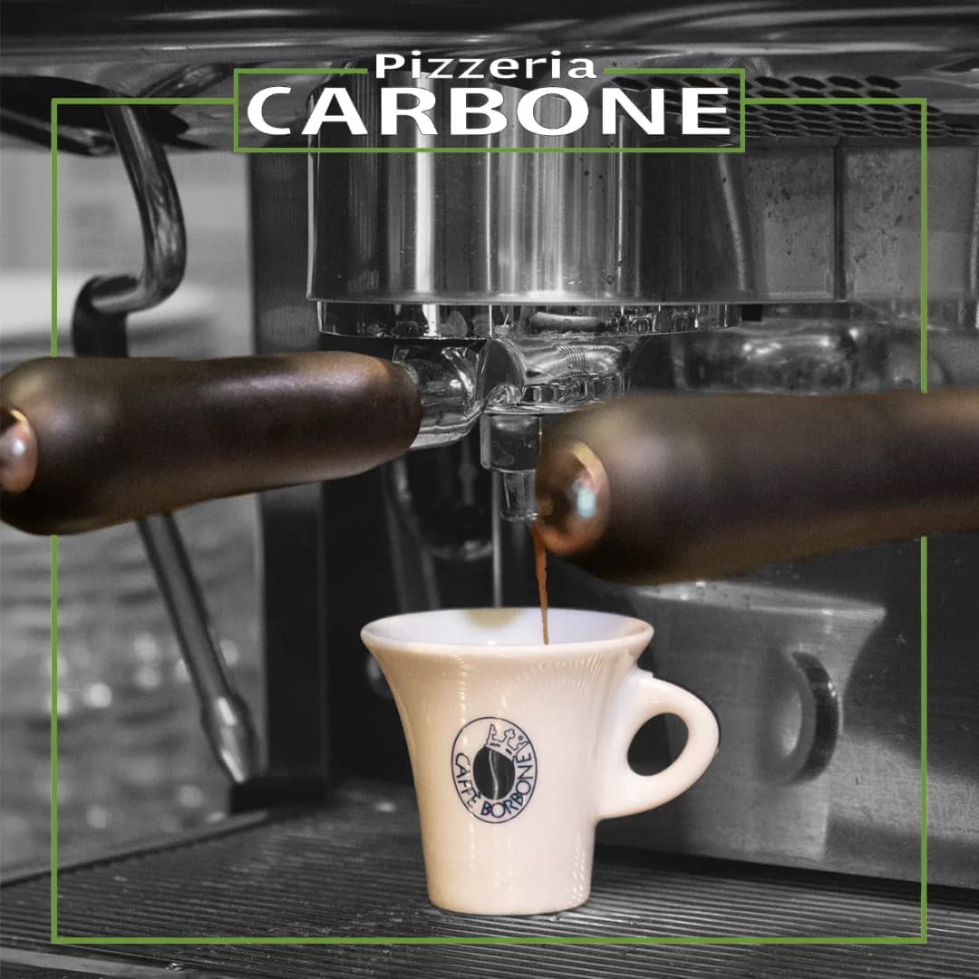Espresso being served in the pizzeria’s cup